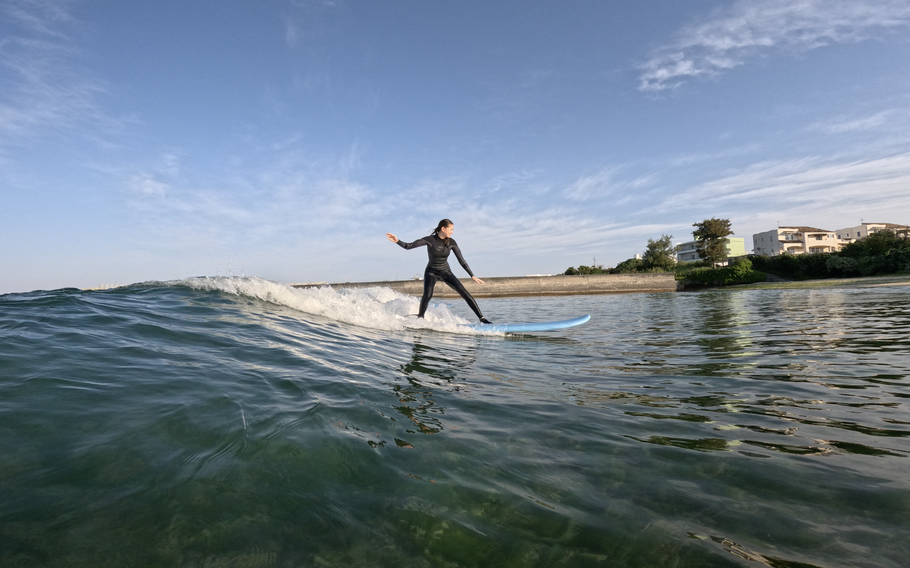 a woman surfing